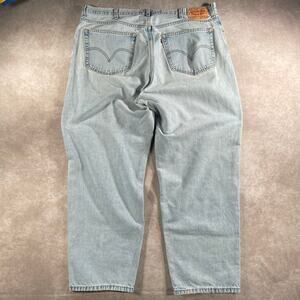 Vintage Levi’s 560 Light Wash Baggy Denim Jeans 42x28